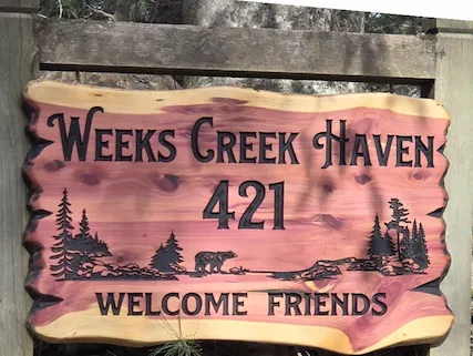 Cedar Weeks Creek Haven welcome sign